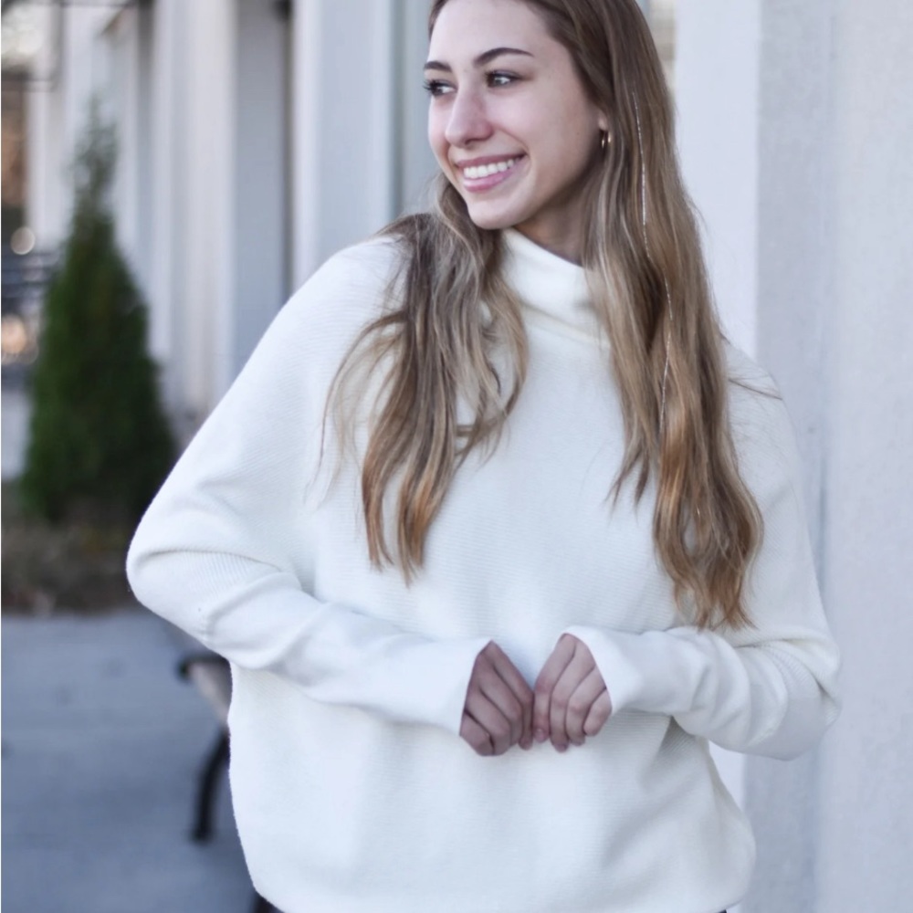 Beautiful Doleman slouch neck style sweater with fitted sleeves and hem in white